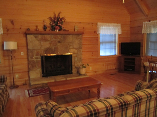 Cable TV, Hot tub, trash pick up, Two queen-size beds includes linens, bathroom shower/tub & two sinks, hairdryer, towels & wash clothes, kitchen includes range, refrigerator, microwave, toaster, coffeemaker | Highland Glade Cabin Rentals | Gatlinburg, TN
