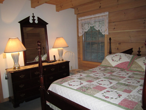 Cable TV, Hot tub, trash pick up, Two queen-size beds includes linens, bathroom shower/tub & two sinks, hairdryer, towels & wash clothes, kitchen includes range, refrigerator, microwave, toaster, coffeemaker | Highland Glade Cabin Rentals | Gatlinburg, TN